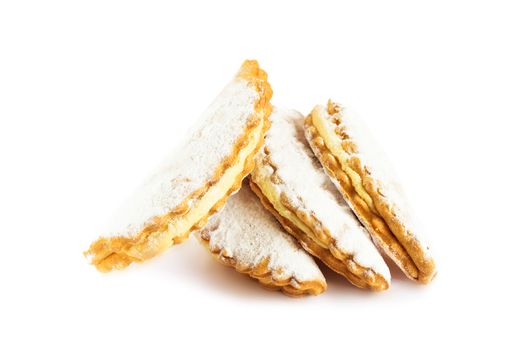 A confection isolated on a white background. Sweet cakes, cookies, muffins, shortbread cookies in front of a white background