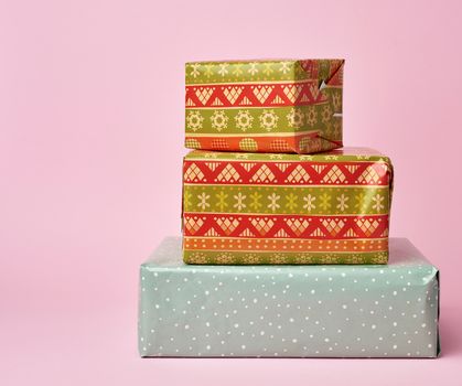 stack of colored paper wrapped gift boxes. Beautiful box gift, great design for any purposes.