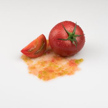 fresh wet tomatoes on a white background. sliced tomatoes with pulp