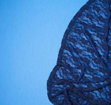 fragment of blue guipure, full frame, copy space