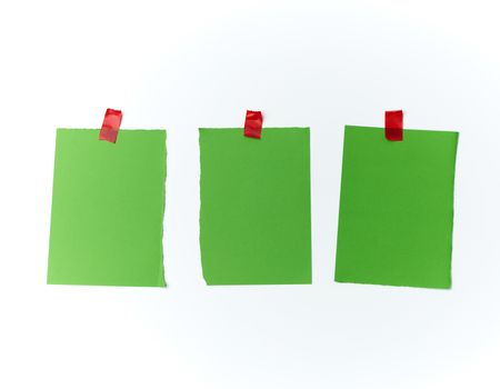 lot of torn green pieces of paper glued with scotch tape on a white background, place for text