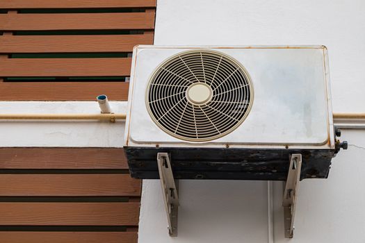 air conditioning systems installed on the walls of the exterior building