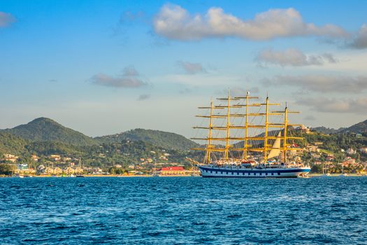 big naval clipper anchored at the Rodney bay with town in the background, Saint Lucia, Caribbean sea