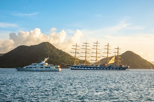 Motor yacht and big naval clipper anchored at the Rodney bay with , Rodney bay, Saint Lucia, Caribbean sea