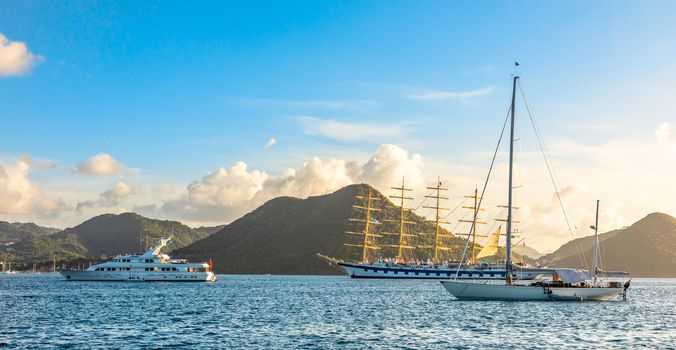 Yachts anchored at the Rodney bay with big naval clipper, Rodney bay, Saint Lucia, Caribbean sea