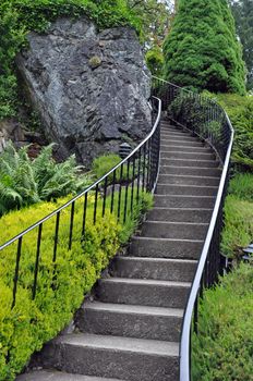 Steep garden stairs in botanical park