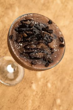 chocolate smoothie on a light brown background