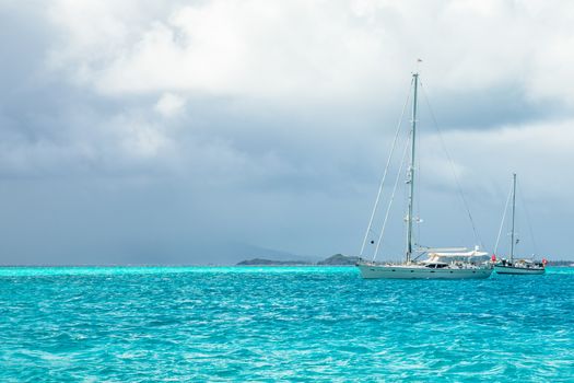 Turquoise sea and anchored yachts, Tobago Cays, Saint Vincent and the Grenadines, Caribbean sea