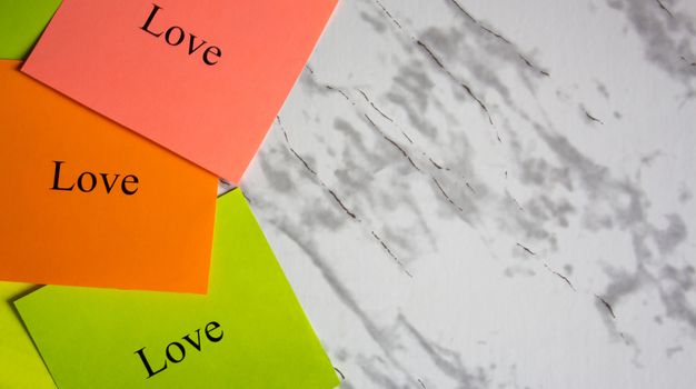Copy space, creativity, project, art. Vision board. Motivational words on colorful stickers on a marble table. Business plan, strategy, concept, future.