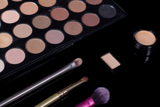 Make-up brushes. Eye shadow palette. Makeup kit. Cosmetic set. Beauty, fashion, style and skin care.