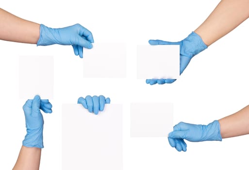 Pieces of blank paper in hands in medical gloves, isolated on white background