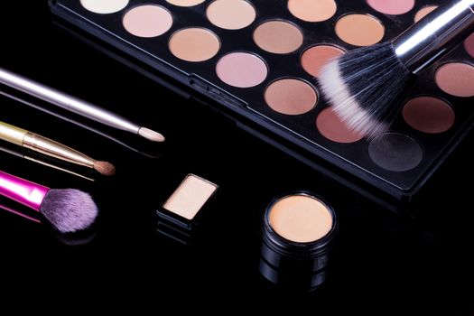 Make-up brushes. Eye shadow palette. Makeup kit. Cosmetic set. Beauty, fashion, style and skin care.