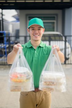 Food delivery when Lock down and Self-quarantine at home. New normal and life after COVID in Thailand, Asia. Social distancing and stay home stay safe.