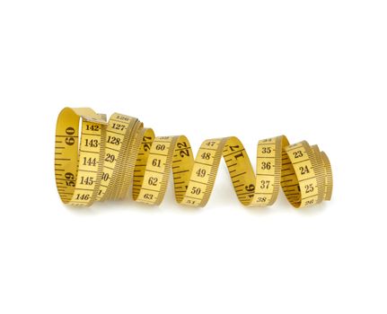 twisted yellow measuring tape isolated on white background, close up