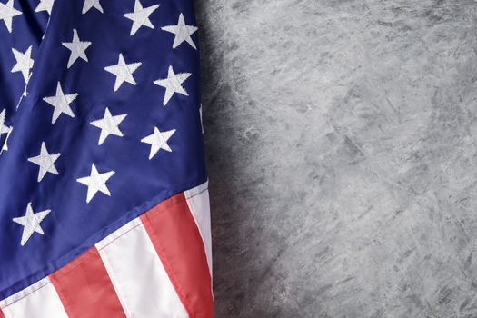 American flag on cement background