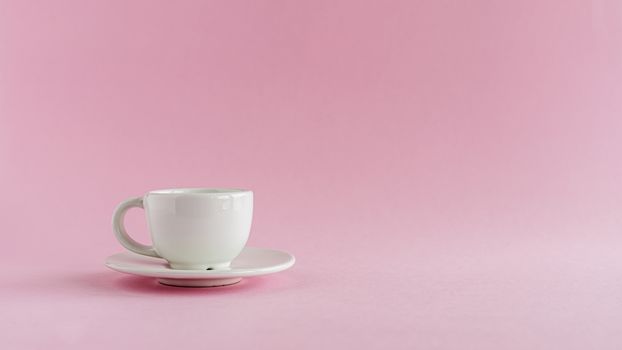 White coffee cup on pink background for drinks, beverage, utensil and dishware concept