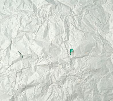 empty gray crumpled sheet of paper, full frame