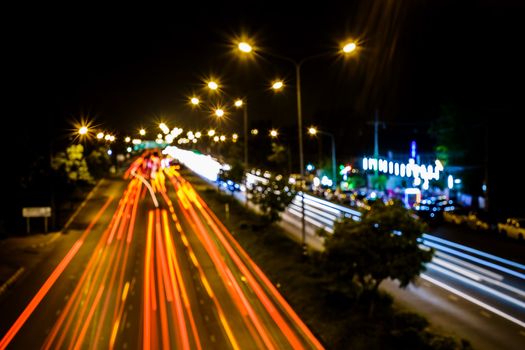 Abstract background, speed car light on the traffic road at night