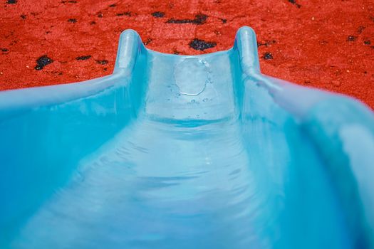 Blue plastic playground slider for kids or children