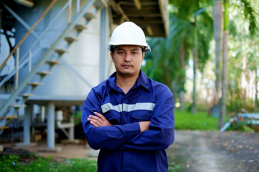 Engineer standing in front of the production line process plant