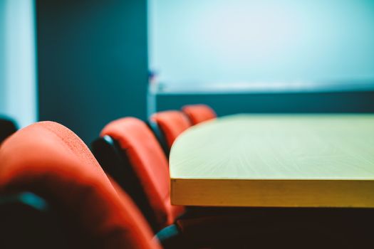 Meeting room, selective focus and added color filter