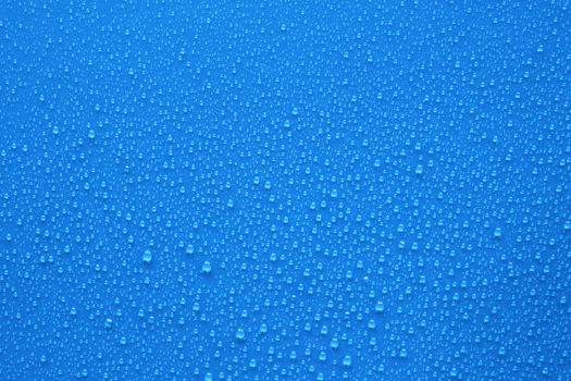 Water drops on blue background
