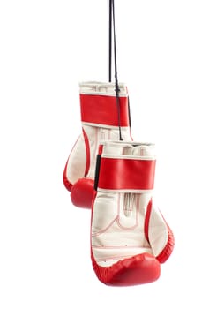 pair of red leather boxing gloves hanging on a black rope, object isolated