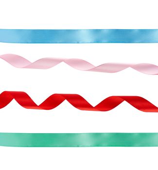green and blue straight, curled red and pink satin ribbons isolated on white background, festive backdrop