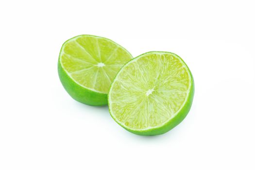 Lime with slices half isolated on white background. Green citrus fruit. with clipping path
