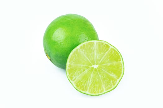 Lime with slices half isolated on white background. Green citrus fruit. with clipping path