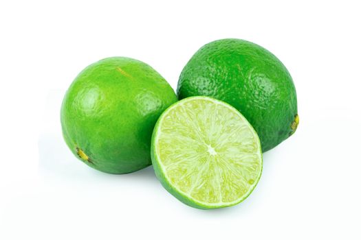 Lime with slices half isolated on white background. Green citrus fruit. with clipping path