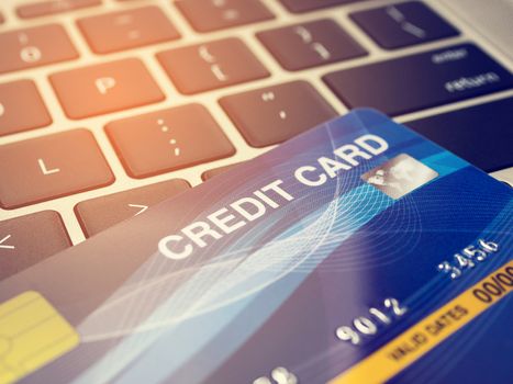 Credit card close up with keyboard, Shopping online concept.