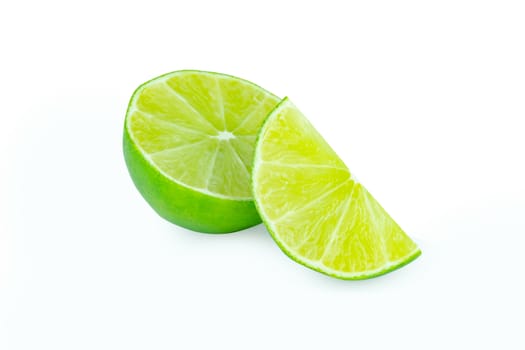 Lime with slices half isolated on white background. Green citrus fruit. with clipping path