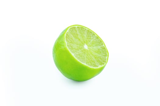 Lime with slices half isolated on white background. Green citrus fruit. with clipping path
