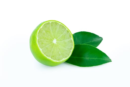 Lime with slices half and leaves isolated on white background. Green citrus fruit. with clipping path