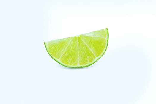 Lime with slices half isolated on white background. Green citrus fruit. with clipping path