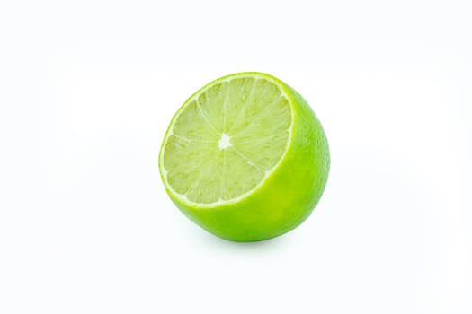 Lime with slices half isolated on white background. Green citrus fruit. with clipping path