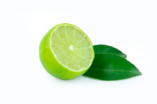 Lime with slices half and leaves isolated on white background. Green citrus fruit. with clipping path