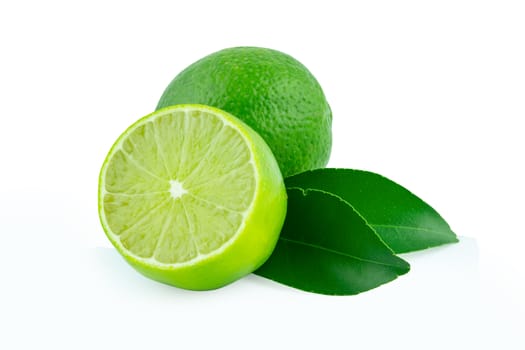 Lime with slices half and leaves isolated on white background. Green citrus fruit. with clipping path