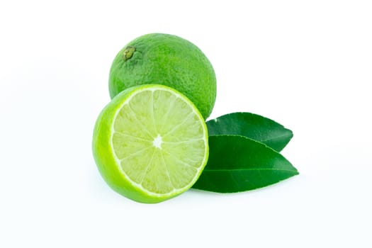 Lime with slices half and leaves isolated on white background. Green citrus fruit. with clipping path