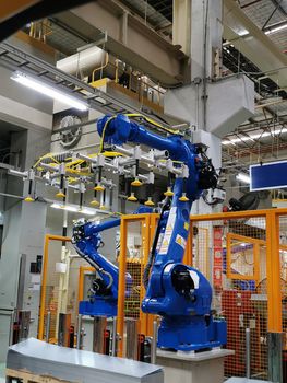 Industrial robot are test run process in assembly factory.