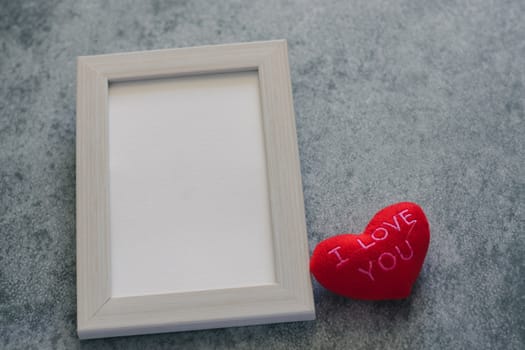 Beautiful cute lovely white pastel frame with red heart I LOVE YOU on black background. Photo for couple and lover,family and friends, romantic valentine. Love concept for happy valentine.