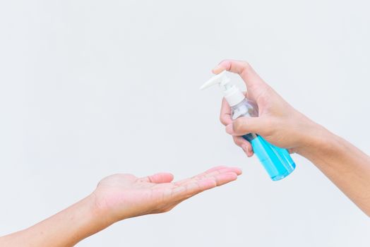 Use sanitizer gel for cleaning the hand for protect health from disease