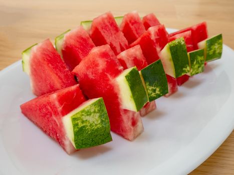Slices of a ripe watermelon on a plate, Selective focus.