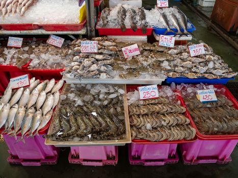 Fresh cockles in the Thai seafood market.