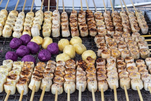 Grilled bananas,sweet potato and purple sweet potato sold  street food stall