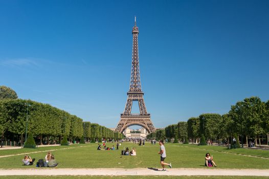 Paris, France - 23 June 2018: Eiffel Tower from the Champ de Mars gardens in summer.