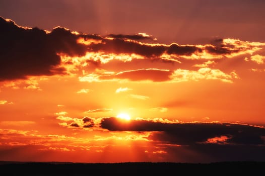 Colorful sunset with black horizon