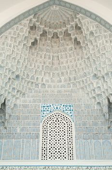 The dome in the form of an arch in traditional Asian mosaic. the details of the architecture of medieval Central Asia