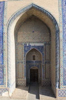 The arch and gates of the ancient Asian traditional ornament. The details of the architecture of medieval Central Asia